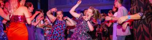 Couple dancing in a Soul Train at Swing Patrol Performance Ball 2023 Pippa & Katie